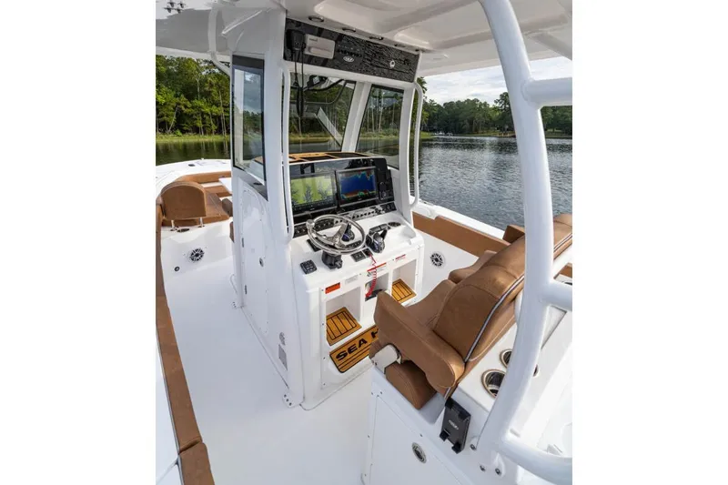  Yacht Photos Pics Manufacturer Provided Image: 2026 Sea Hunt Ultra 285 SE boat interior with advanced navigation system and comfortable seating.