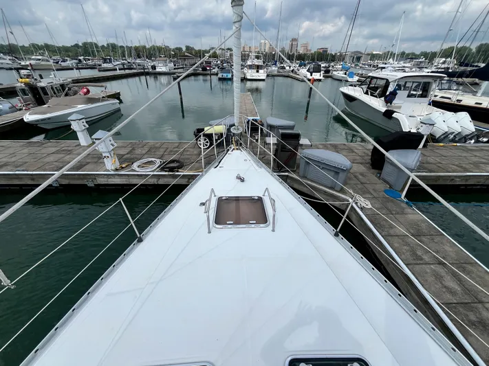 Lali Yacht Photos Pics Bow view of 1994 Beneteau Oceanis 510 CU docked at marina.