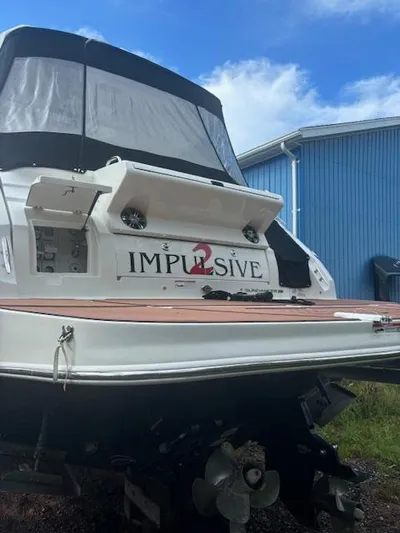  Yacht Photos Pics 2019 Sea Ray 350 Sundancer Coupe docked, featuring "Impulsive" name on the stern.