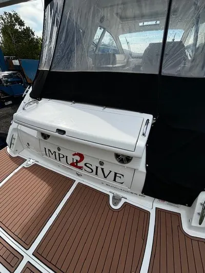  Yacht Photos Pics 2019 Sea Ray 350 Sundancer Coupe with teak deck and custom "Impulsive" nameplate.