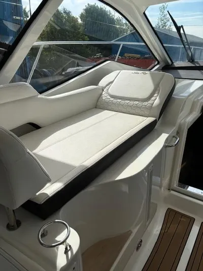  Yacht Photos Pics 2019 Sea Ray 350 Sundancer Coupe interior with luxurious white seating and sleek design.