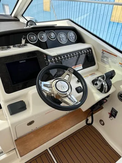  Yacht Photos Pics 2019 Sea Ray 350 Sundancer Coupe helm with modern controls and instruments.
