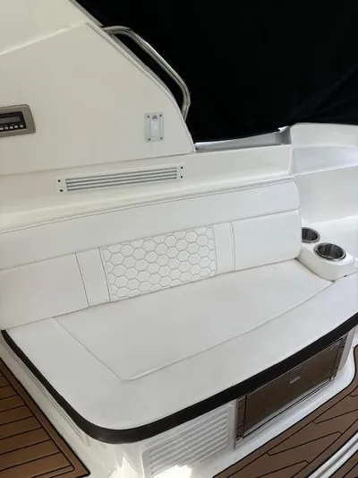  Yacht Photos Pics 2019 Sea Ray 350 Sundancer Coupe interior with white seating and cup holders.