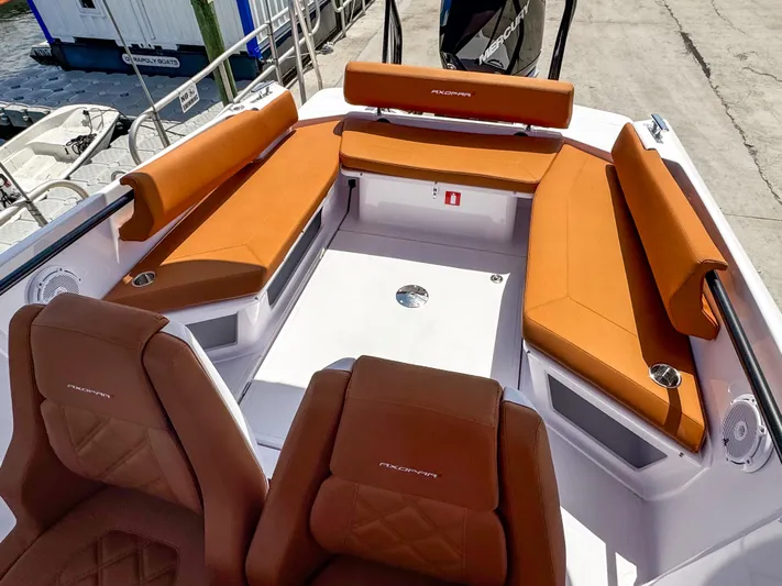 Yacht Photos Pics 2025 Axopar 25 Cross Top boat with orange seating and modern design.