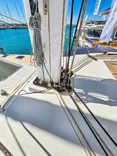 Firefly Yacht Photos Pics Lagoon 620 NEO 2012 yacht deck with rigging and marina view.