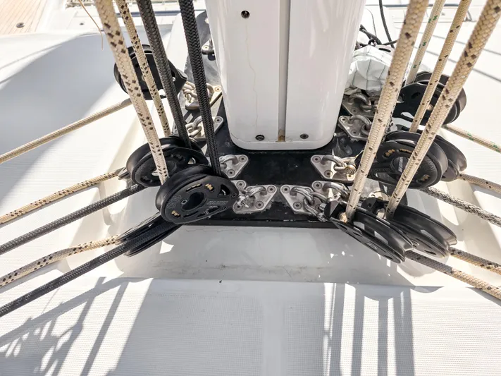 Firefly Yacht Photos Pics Rigging system on a 2012 Lagoon 620 NEO sailboat, featuring ropes and pulleys.