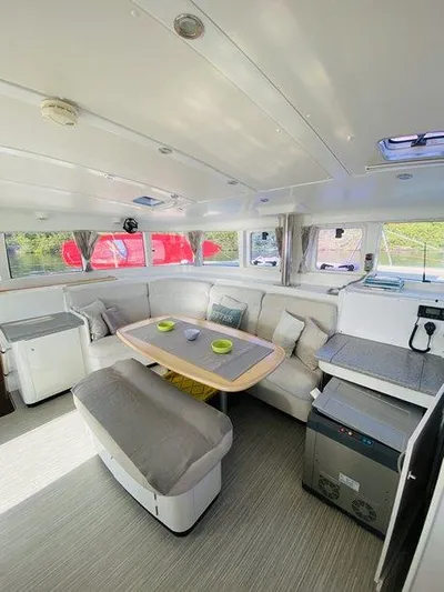 Katarina Yacht Photos Pics Interior of 2010 Lagoon 440 catamaran with modern seating and dining area.