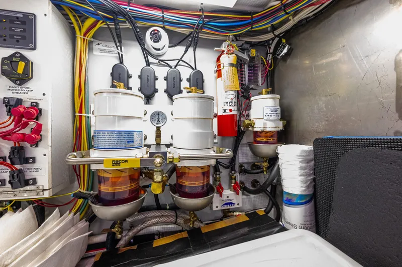 Big Red Yacht Photos Pics Engine room of 2007 American Tug 41 with fuel filters and wiring.