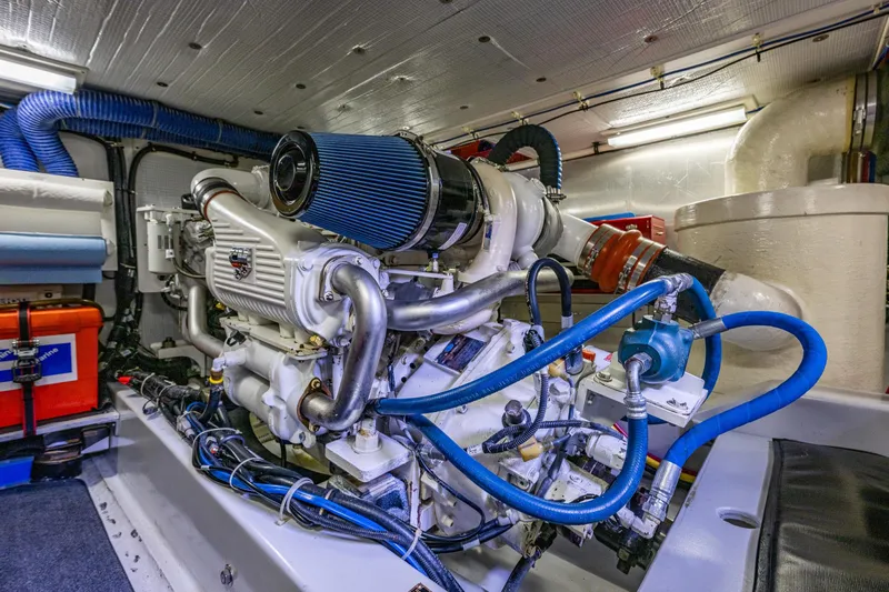 Big Red Yacht Photos Pics Engine room of a 2007 American Tug 41, showcasing detailed mechanical components.