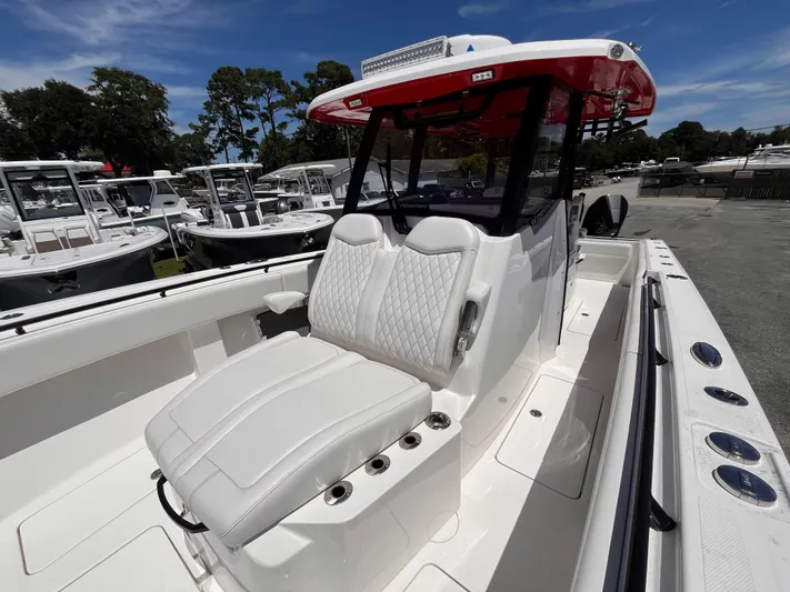  Yacht Photos Pics 2023 Fountain 38 Tournament Edition boat with luxurious seating and sleek design.