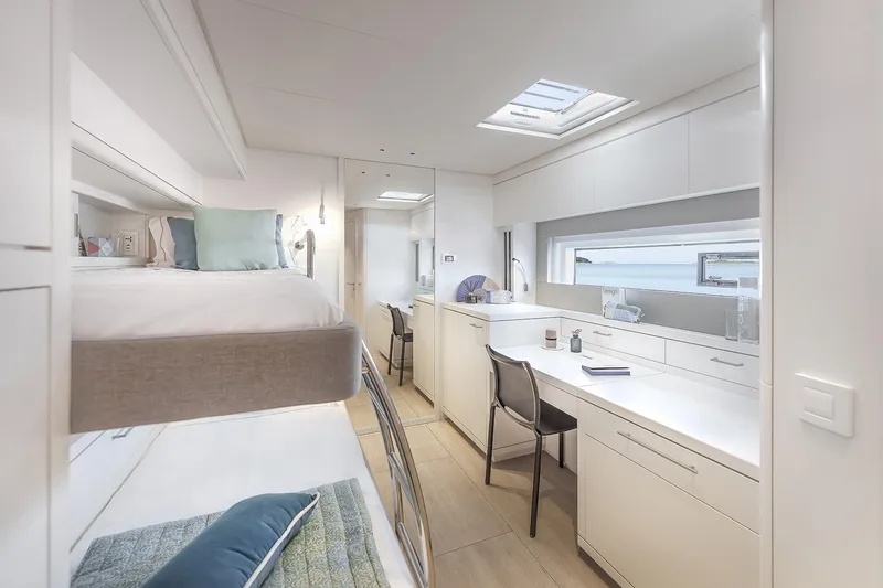 Big Picture Yacht Photos Pics Luxurious interior of 2024 Lagoon SIXTY 5 yacht with modern design and ample natural light.