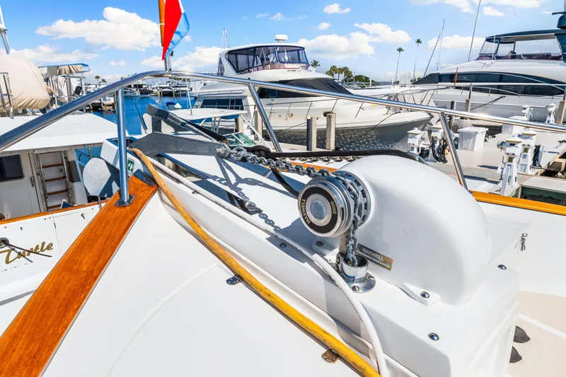 Sugar Yacht Photos Pics 2008 DeFever 52 Euro yacht deck with anchor chain and winch.