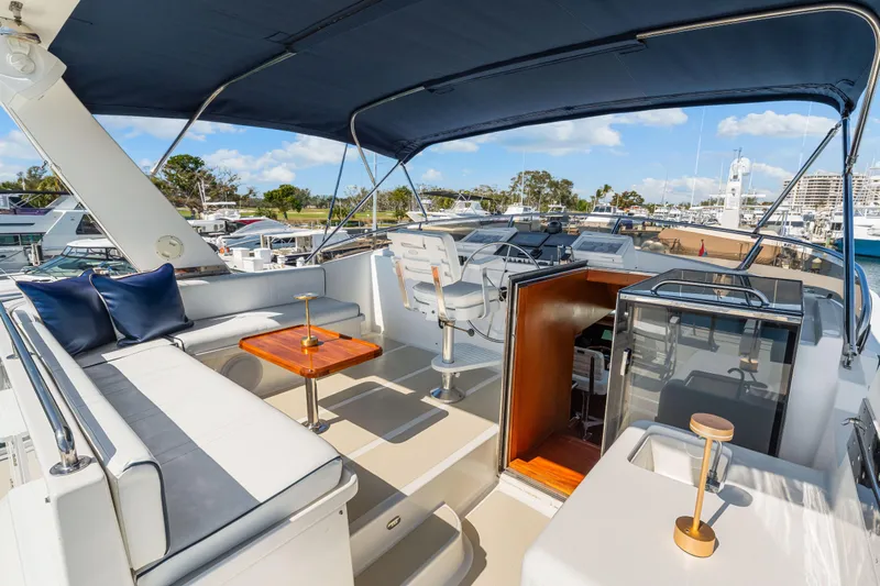 Sugar Yacht Photos Pics Luxurious 2008 DeFever 52 Euro yacht with spacious deck and elegant seating area.