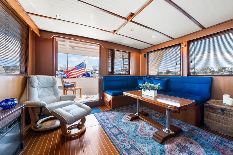 Sugar Yacht Photos Pics Luxurious interior of 2008 DeFever 52 Euro yacht with elegant seating and decor.