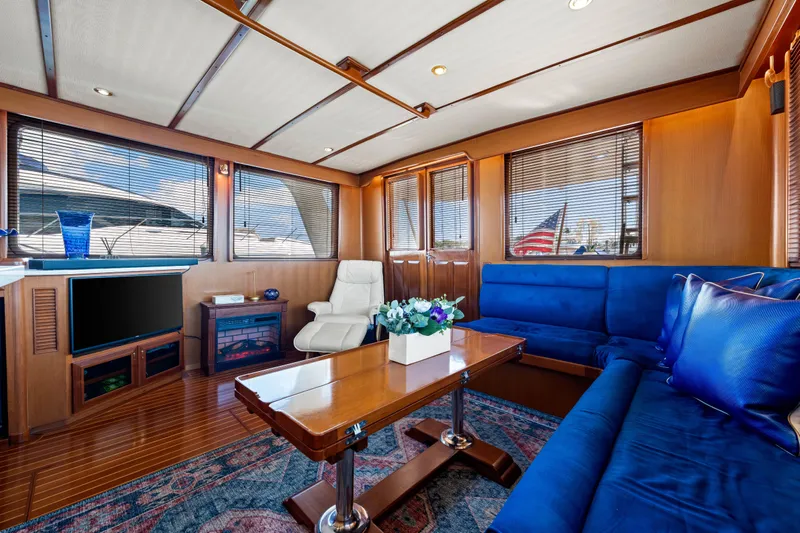 Sugar Yacht Photos Pics Luxurious interior of 2008 DeFever 52 Euro yacht with elegant seating and decor.