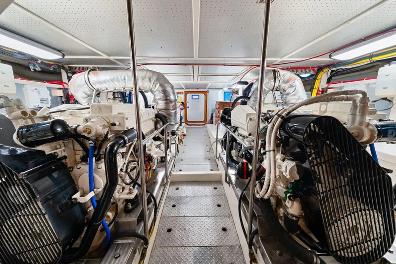 Sugar Yacht Photos Pics Engine room of 2008 DeFever 52 Euro yacht, featuring dual engines and modern equipment.