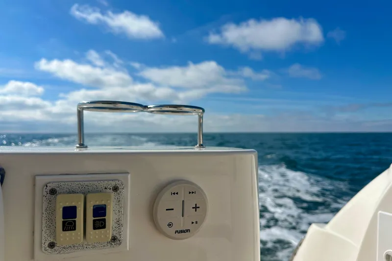  Yacht Photos Pics 2009 Sea Ray 44 Sedan Bridge control panel with ocean view and blue sky.