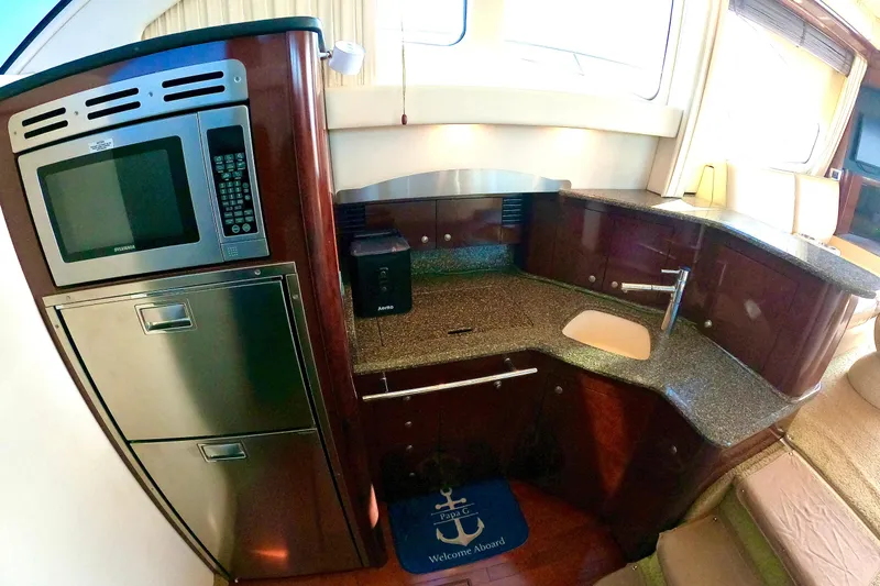  Yacht Photos Pics Luxurious 2009 Sea Ray 44 Sedan Bridge yacht kitchen with modern appliances.