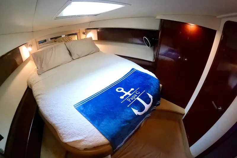  Yacht Photos Pics Luxurious cabin interior of 2009 Sea Ray 44 Sedan Bridge yacht with cozy bedding.