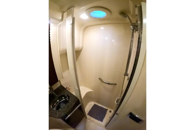  Yacht Photos Pics Luxurious bathroom in 2009 Sea Ray 44 Sedan Bridge yacht with shower and sink.