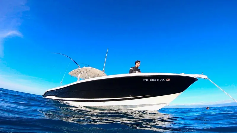  Yacht Photos Pics 2007 Hydra-Sports Vector 3300 CC boat on open water under clear blue sky.