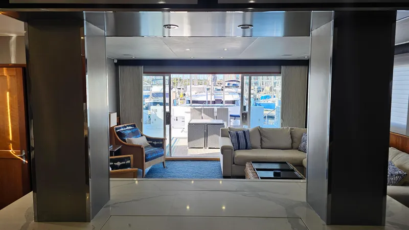 Island Soul Yacht Photos Pics Luxurious 2009 Custom Flybridge Motoryacht interior with elegant seating and marina view.