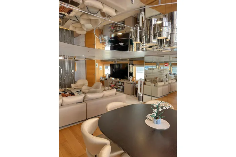  Yacht Photos Pics Luxurious yacht interior with modern decor, plush seating, and elegant dining area, Factoria Naval de Marin 40, 2013.