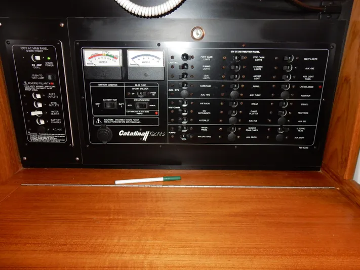 Milky Way Yacht Photos Pics Electrical control panel of a 2004 Catalina 350 yacht with gauges and switches.