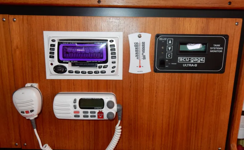 Milky Way Yacht Photos Pics Control panel of a 2004 Catalina 350 boat with radio and monitoring systems.