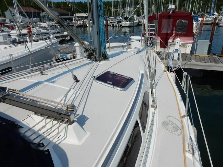 Milky Way Yacht Photos Pics 2004 Catalina 350 sailboat docked at marina, showcasing deck and rigging.