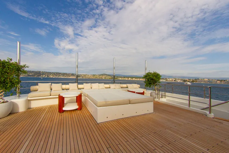  Yacht Photos Pics Luxurious yacht deck with seating, ocean view, and clear skies, Factoria Naval de Marin 40, 2013.