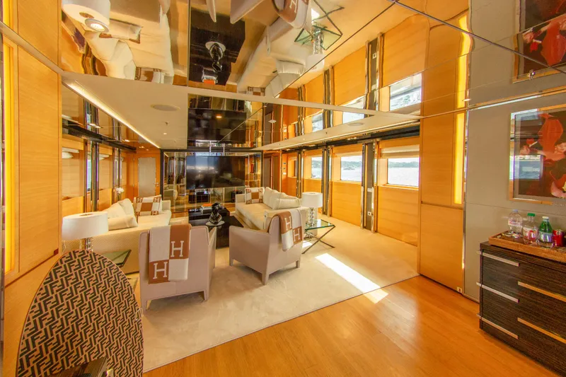  Yacht Photos Pics Luxurious yacht interior with elegant seating, mirrored ceiling, and wooden accents, Factoria Naval de Marin 40, 2013.