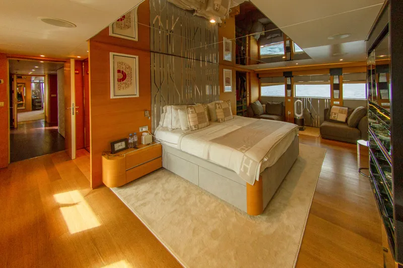  Yacht Photos Pics Luxurious yacht bedroom with modern decor, wood accents, and large windows, Factoria Naval de Marin 40, 2013.
