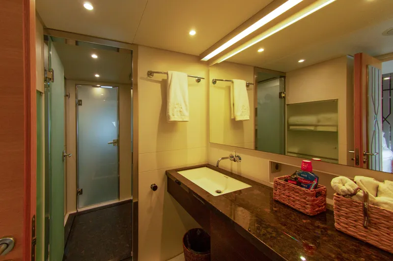  Yacht Photos Pics Luxurious yacht bathroom with modern fixtures, glass shower, and elegant countertop, Factoria Naval de Marin 2013.