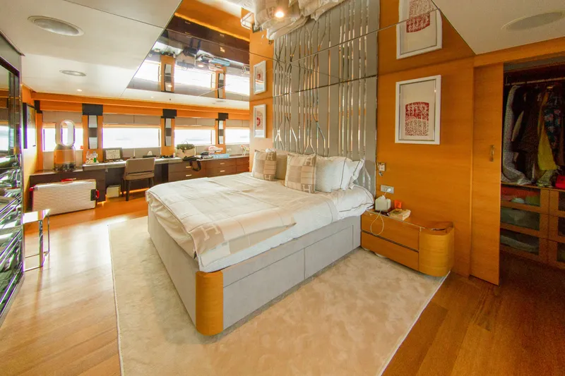  Yacht Photos Pics Luxurious yacht bedroom with modern decor, wood accents, and large windows, Factoria Naval de Marin 40, 2013.
