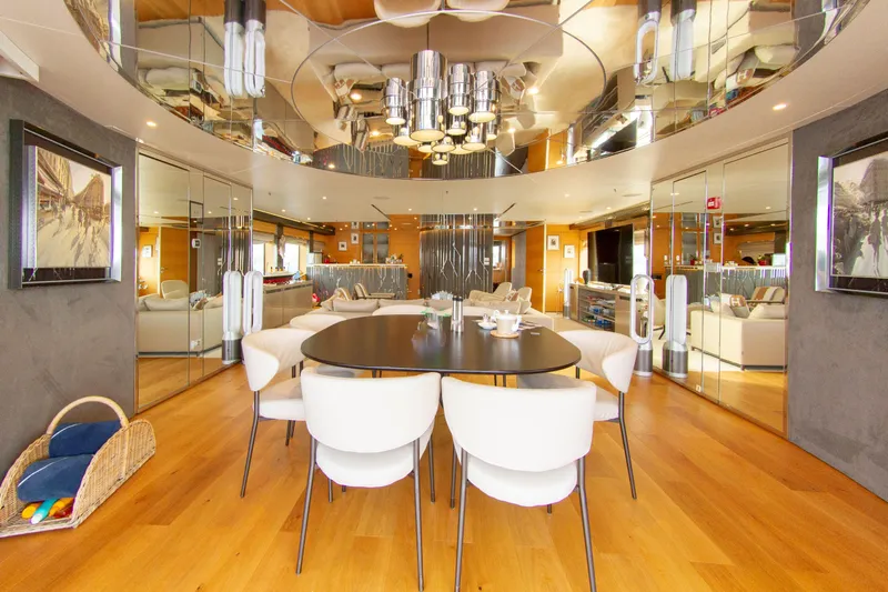  Yacht Photos Pics Luxurious yacht interior with modern dining area, mirrored walls, and elegant decor, Factoria Naval de Marin 40.