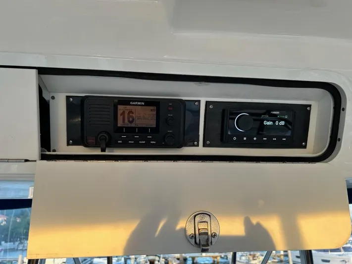 Someday Came Yacht Photos Pics Control panel of a 2008 Sea Ray 47 Sedan Bridge yacht with navigation equipment.