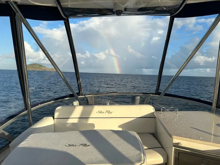 Someday Came Yacht Photos Pics 2008 Sea Ray 47 Sedan Bridge interior with ocean view and rainbow.