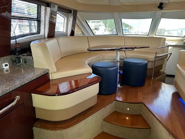Someday Came Yacht Photos Pics Luxurious interior of 2008 Sea Ray 47 Sedan Bridge yacht with elegant seating and modern design.