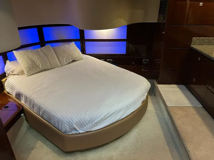 Someday Came Yacht Photos Pics Luxurious bedroom interior of 2008 Sea Ray 47 Sedan Bridge yacht with modern lighting.