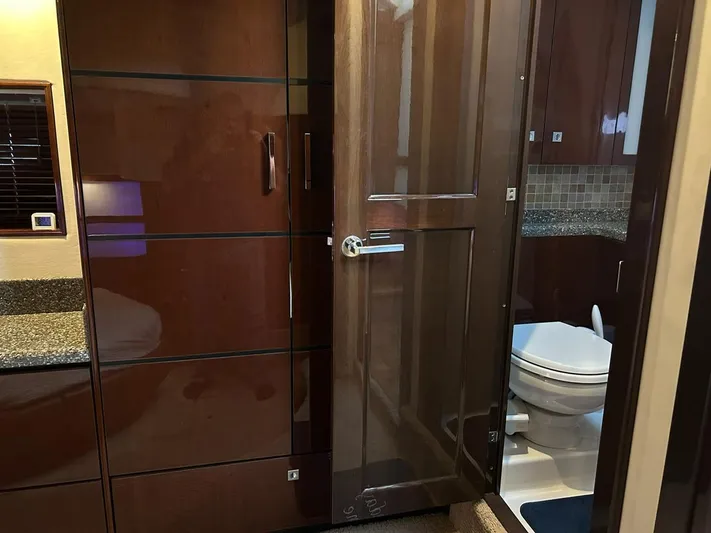 Someday Came Yacht Photos Pics Luxurious bathroom interior of 2008 Sea Ray 47 Sedan Bridge yacht, featuring sleek wood finishes.