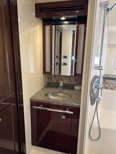 Someday Came Yacht Photos Pics Luxurious bathroom in 2008 Sea Ray 47 Sedan Bridge yacht with modern fixtures.