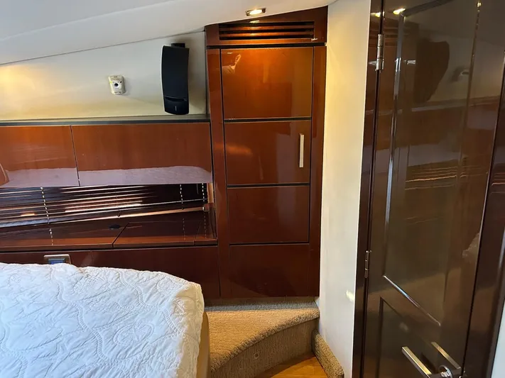 Someday Came Yacht Photos Pics Luxurious interior of 2008 Sea Ray 47 Sedan Bridge yacht with wood cabinetry.