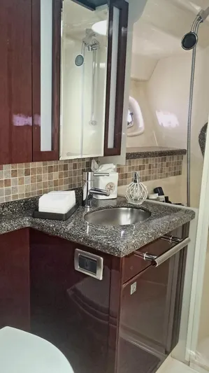 Someday Came Yacht Photos Pics Luxurious bathroom in 2008 Sea Ray 47 Sedan Bridge yacht with modern fixtures.