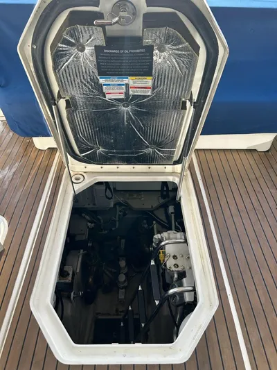 Someday Came Yacht Photos Pics Engine compartment of 2008 Sea Ray 47 Sedan Bridge yacht, open hatch view.