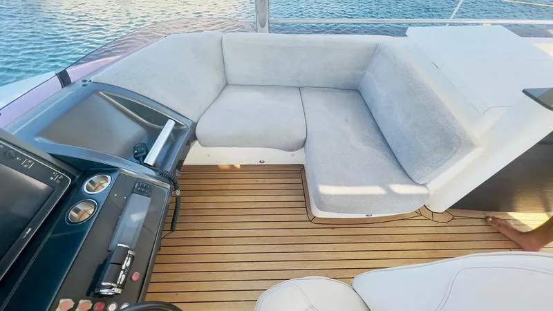  Yacht Photos Pics Luxurious seating area on a 2015 Princess 82 yacht.