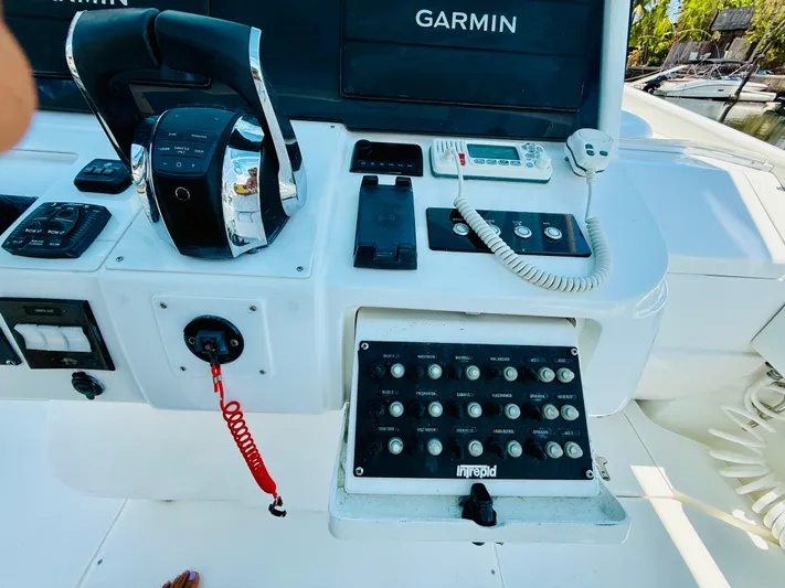  Yacht Photos Pics Control panel of a 2003 Intrepid 377 boat with Garmin navigation equipment.