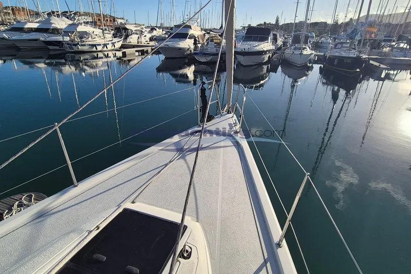  Yacht Photos Pics Italia Yachts 11.98, 2021 model, docked in a serene marina setting.