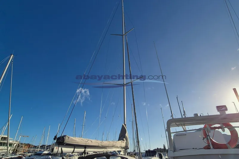  Yacht Photos Pics Italia Yachts Italia 11.98 sailboat, 2021 model, docked under a clear blue sky.