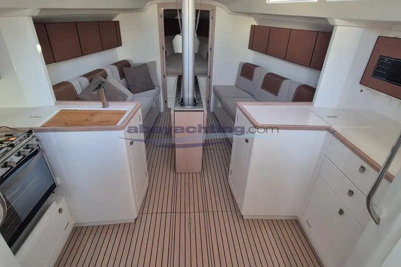  Yacht Photos Pics Interior of 2021 Italia Yachts Italia 11.98, featuring modern kitchen and seating area.